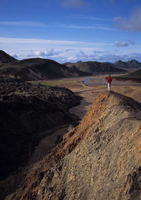 Man admiring the view in landmannalaugar / iceland