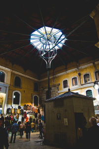 People in building at night