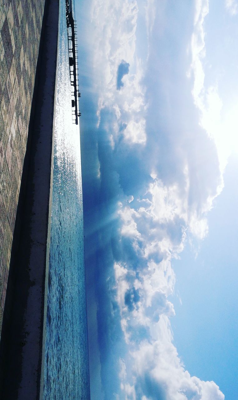 sky, low angle view, cloud - sky, no people, nature, day, water, beauty in nature, scenics, outdoors, tree, close-up