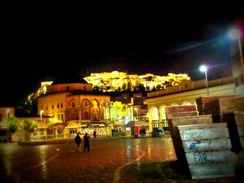 View of illuminated city at night