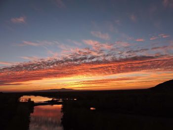 Scenic view of dramatic sky during sunset