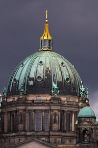 View of cathedral against storm clouds