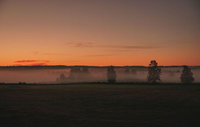 Scenic view of landscape against sky during sunset