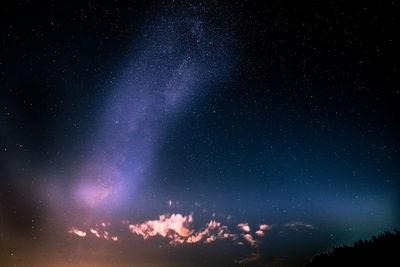 Low angle view of stars against sky at night