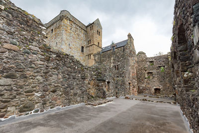 View of historical building against cloudy sky