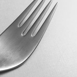 Close-up of object over white background