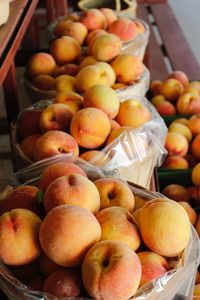 Fruits in basket for sale at market stall