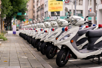 Bicycles parked on street in city