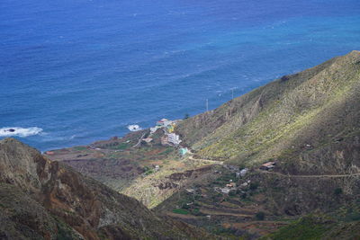 High angle view of beach against blue sky