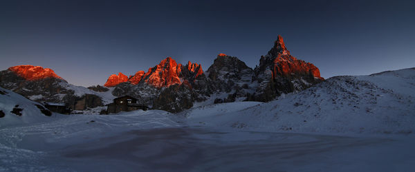 Italy, dolomities unesco heritage. scenic view of snowcapped  montains against clear sky. 