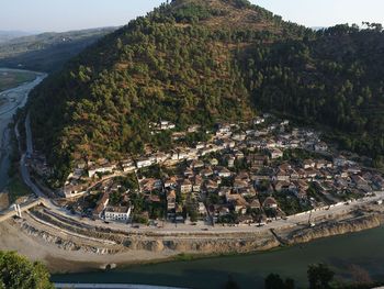 High angle view of city by river