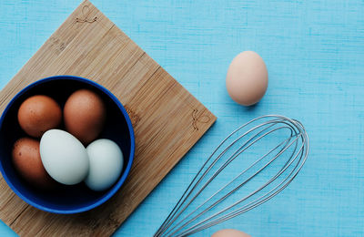 High angle view of eggs in container on table