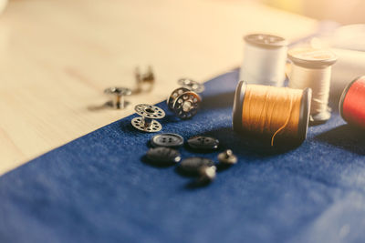 High angle view of various buttons on table