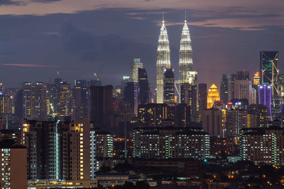 Kuala lumpur illuminated skyline at night