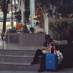 Woman sitting on bench