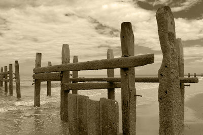 Scenic view of sea against cloudy sky