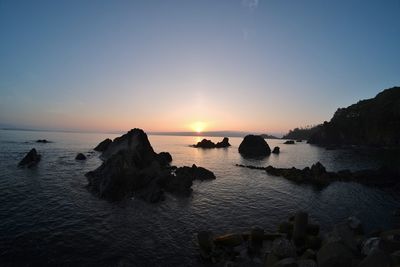 Scenic view of sea against sky during sunset