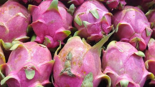 Full frame shot of pink fruits for sale in market