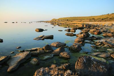 Scenic view of calm sea against clear sky