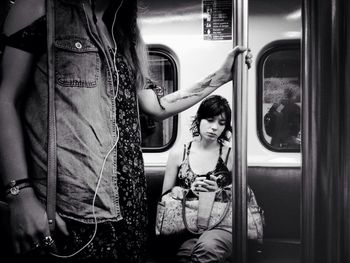 Woman sitting in bus