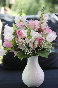 Close-up of white flowers in vase