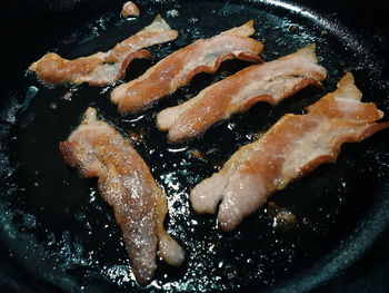 High angle view of meat in cooking pan