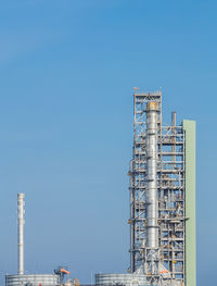 Low angle view of building against blue sky