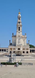 View of historic building against clear blue sky