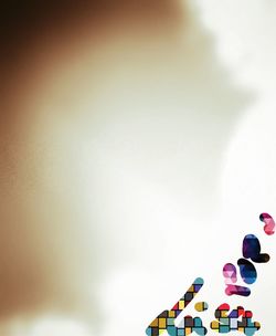 Low angle view of multi colored umbrellas on table