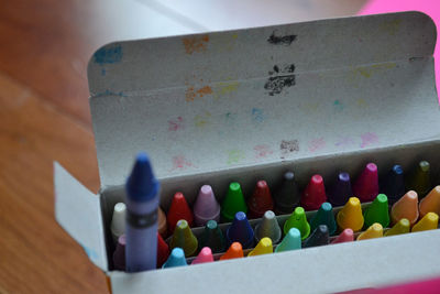 High angle view of multi colored paper on table