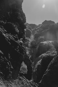 Low angle view of rock formation against sky