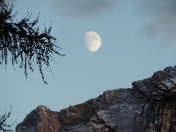 Low angle view of full moon in sky