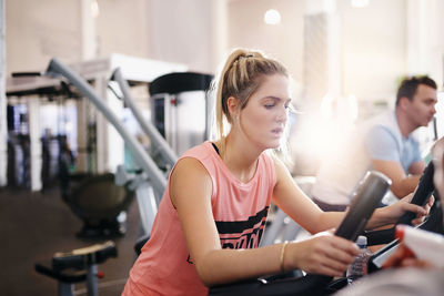 Woman exercising at gym