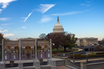 Buildings in city against sky