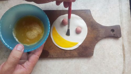 Close-up of hand holding drink