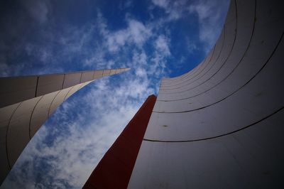 Low angle view of built structure against cloudy sky