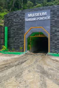 Information sign on wall of building