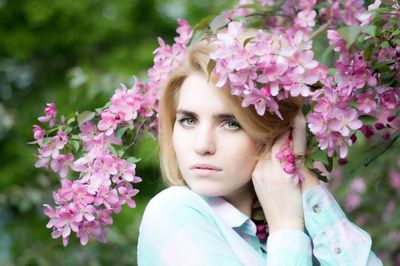 Close-up of woman holding flower