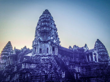 Low angle view of temple building against clear sky