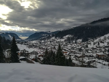 Scenic view of mountains against sky during winter