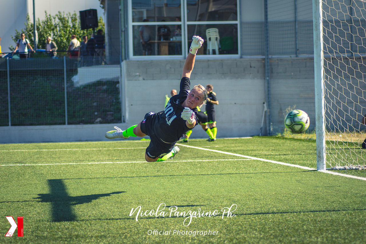 PEOPLE PLAYING SOCCER BALL