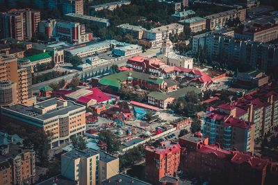 Aerial view of city lit up at night