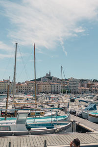 Boats moored at harbor