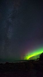 Scenic view of sea against sky at night