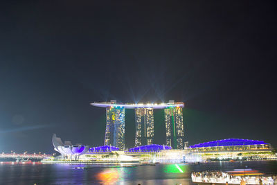 Illuminated modern building in city at night