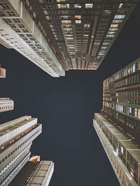 Directly below shot of modern buildings in city