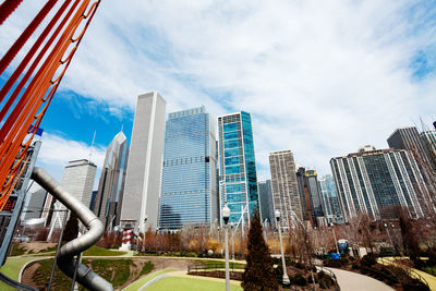 Low angle view of buildings against sky in city