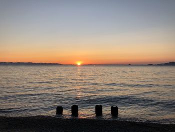 Scenic view of sea against sky during sunset