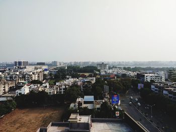 High angle view of buildings against clear sky