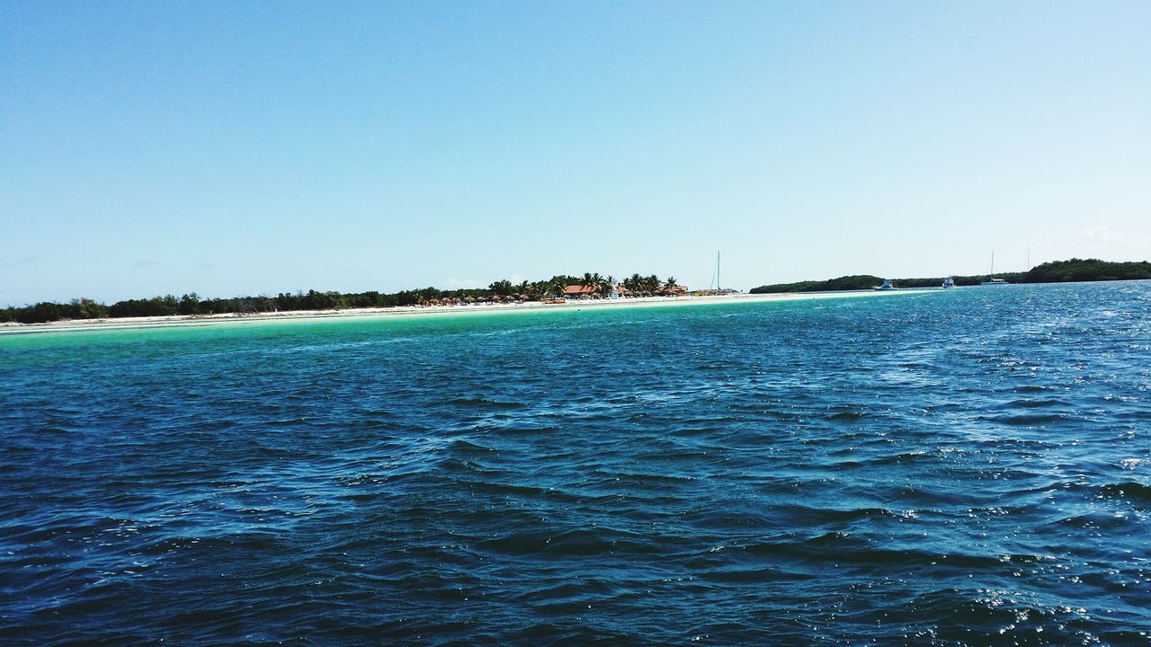 SCENIC VIEW OF SEA AGAINST BLUE SKY